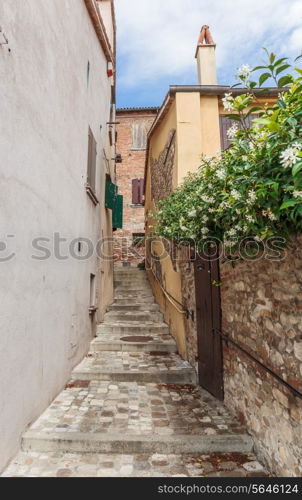 Narrow street in the old town in Italy