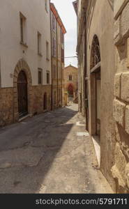 Narrow street in the old town in Italy