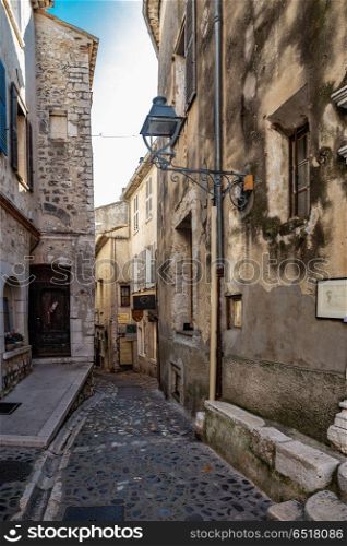 Narrow street in the old village, France. . Narrow street in the old village Vence, France.. VENCE, FRANCE - 30 OCTOBER, 2014: Narrow street in the old village