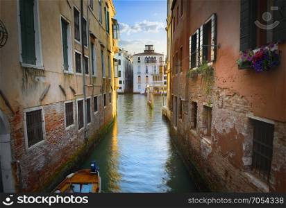 Narrow street in Venice leading to a pier, Italy