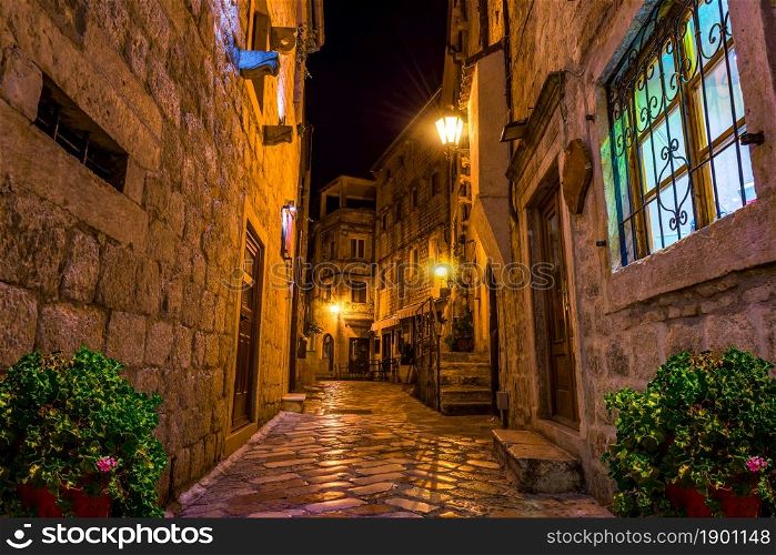 Narrow street of Old Town in Kotor at night. Narrow Kotor street