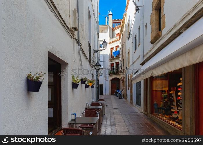 Narrow street of Old Town, Tossa de Mar, Costa Brava, Catalonia, Spain