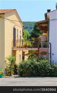 Narrow street of small picturesque Italian town on Elba Island, Italy