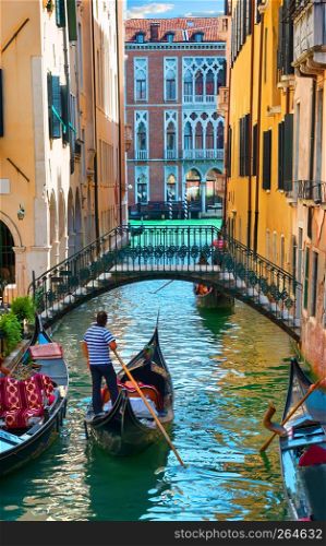 Narrow street of Venice on waters of Grand Canal