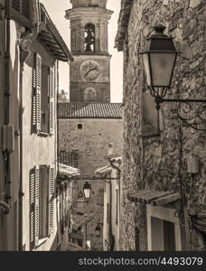 Narrow streets in the old village Lyuseram, France. Toned