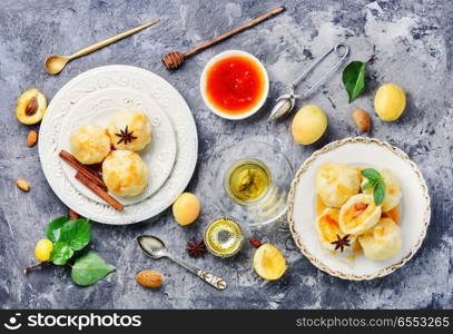 National dish of Czech and Slovak cuisine of dumplings with apricot. Dumplings with apricot and syrup