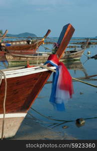 National fishing boats on the shore of the Indian Ocean Phuket Thailand