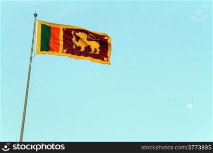 National flag of Sri Lanka and Moon on the sky