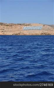 national flag on a greek island (defensive territory from Turkey invasions)