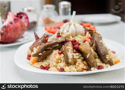 National rice pilaw with lamb and pomegranate