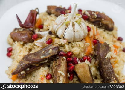 National rice pilaw with lamb and pomegranate