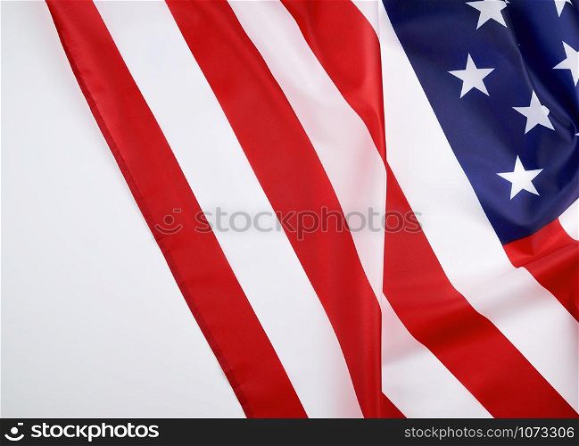 national textile flag of United States of America, surface in waves. Independence Day Background, copy space