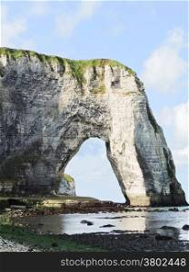 natural arch cliff on english channel beach of Eretrat cote d&rsquo;albatre, France