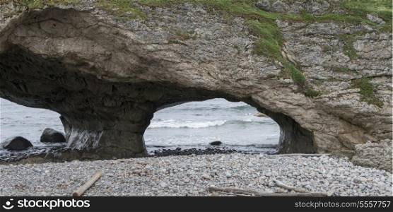 Natural arch formation at coast, Portland Creek, Gros Morne National Park, Newfoundland And Labrador, Canada