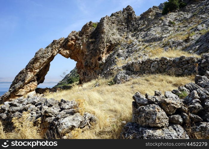 Natural arch on the bank of Egirdir lake, Turkey