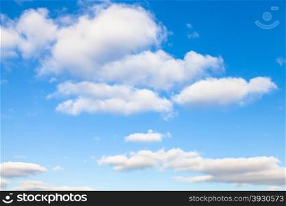 natural background - white clouds in blue sky in autumn sunny day