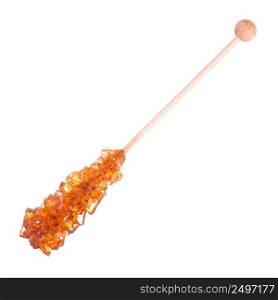 Natural big shiny brown sugar crystals on wooden stick isolated on white background