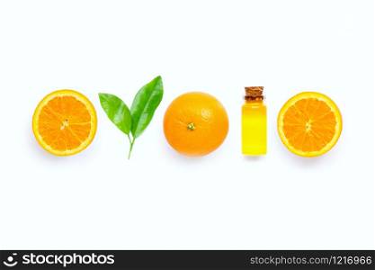 Natural citrus oil with fresh orange fruit and green leaves on white background. High vitamin C. Copy space