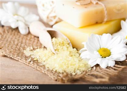 Natural cosmetics concept: soap with daisies