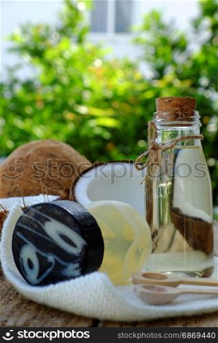 Natural cosmetics from coconut copra, skin care product as coconut oil,soap bar on green background, organic cosmetic good for health