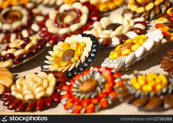 Natural decorations handmade from various seeds