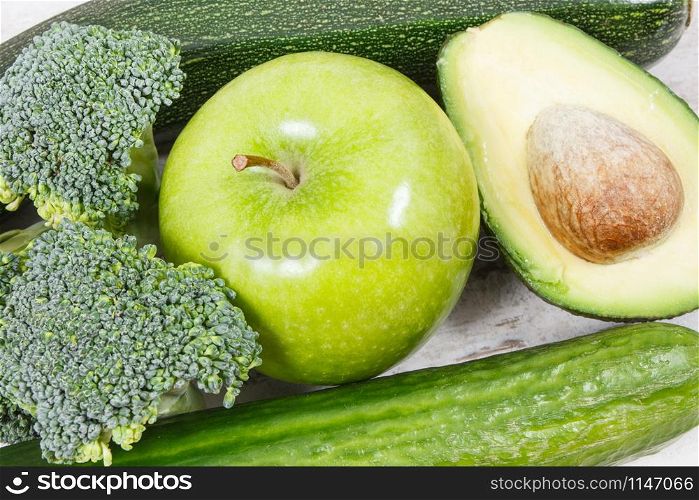 Natural fresh green fruit and vegetables as source vitamins and minerals, concept of healthy nutrition. Natural green fruit and vegetables as source vitamins and minerals, healthy nutrition concept