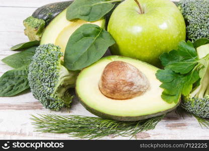 Natural fresh green fruit and vegetables as source vitamins and minerals, concept of healthy nutrition. Natural green fruit and vegetables as source vitamins and minerals, healthy nutrition concept