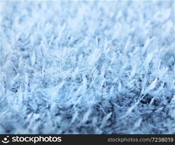 Natural frost close-up snow ice crystals background
