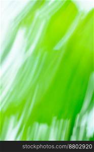 Natural green long time exposure motion blur. Natural green art blurred bokeh background with motion effect.. Green nature decorative backdrop fast speedy motion no focus