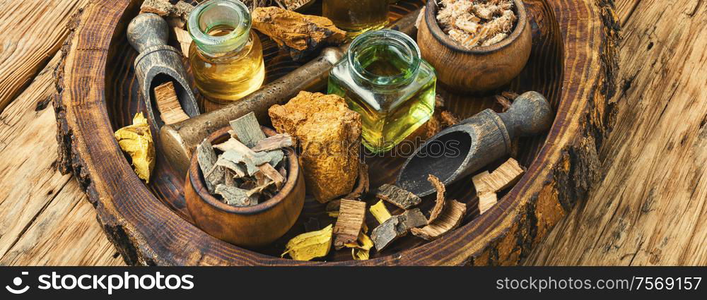 Natural herbal medicine sets on old wooden table. Natural herbs medicine