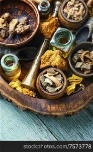 Natural herbal medicine sets on old wooden table. Natural herbs medicine