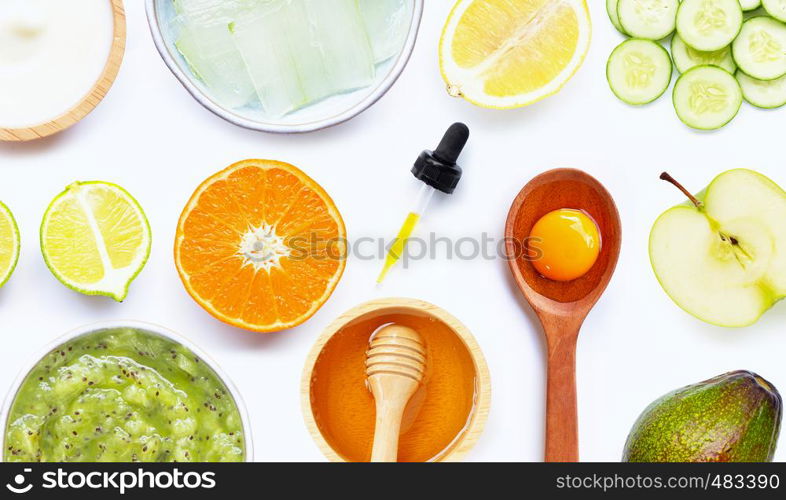 Natural ingredients for homemade skin care on white background.