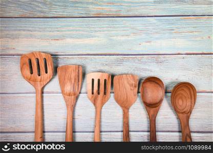 Natural kitchen tools wood products / Kitchen utensils background with spoon ladle spatula various sizes object utensil wooden concept , selective focus