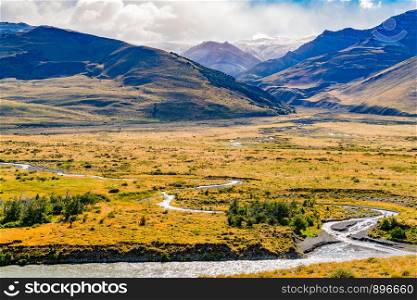 Natural landscape of Los Glaciares National Park with high mountain and river at El Chalten, Argentina