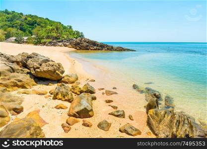 Natural landscape of sea and tropical island with rocks on beach