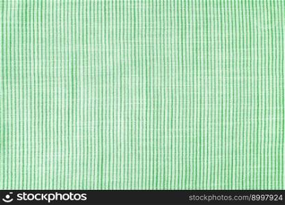 Natural linen texture as background. Cotton fabric with green and white line striped pattern, texture close up, top vies, flat lay. Backdrop, wallpaper. Matereal for clothes, curtain and upholstery