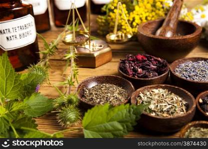 Natural medicine, herbs, mortar, natural colorful tone