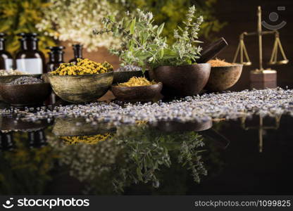 Natural medicine in black mirror background