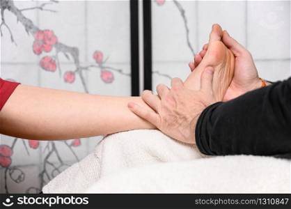 Natural medicine, reflexology acupressure foot massaging .. Natural medicine, reflexology acupressure foot massaging.