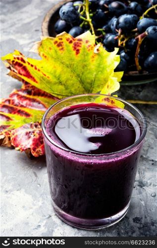 Natural organic juicy grapes and grape fruit. Grape drink in a glass