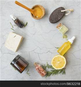 Natural organic spa ingredients with manuka honey, essential oil bottle, clay powder , bath salt, rosemary branches, natural soap, lemon top view with copy space 