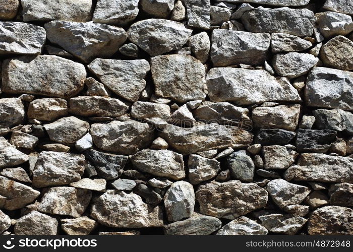 Natural pattern of a stone wall. Image of stone rock texture wall. background closeup