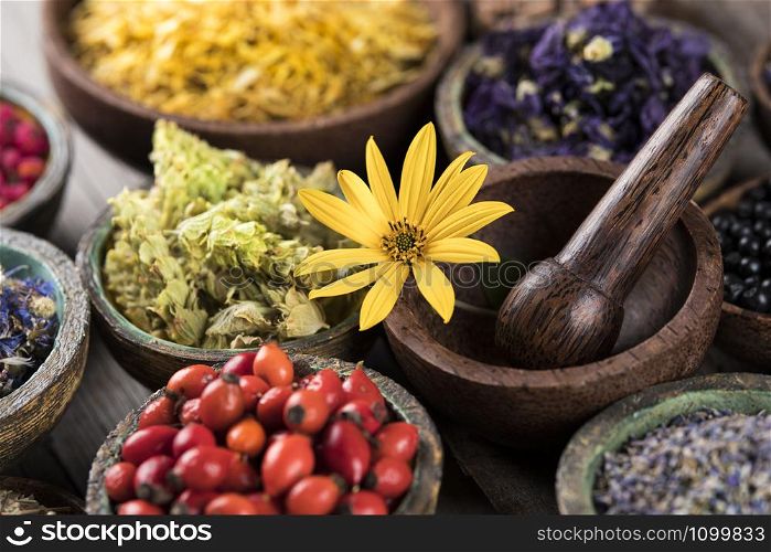 Natural remedy and wooden table background
