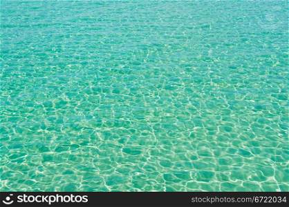 natural sea water texture with patches of sun