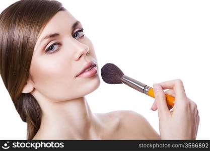 natural sexy woman with cosmetic brush on white background