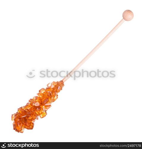 Natural shiny brown sugar crystals on wooden stick isolated on white background