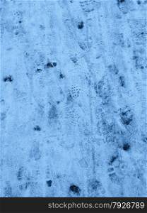 Natural snow texture with footprints