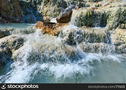 Natural spa with waterfalls and hot springs at Saturnia thermal baths, Grosseto, Tuscany, Italy