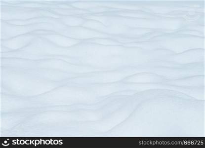 Natural winter Christmas background with snowdrifts. Winter landscape with falling christmas shining beautiful snow