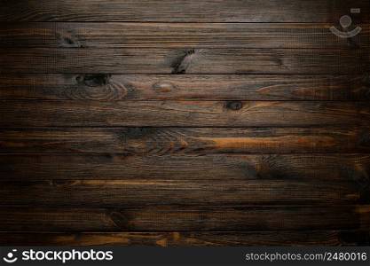 Natural wood background. Wood texture. Table of blank dark rustic planks top flat lay view.